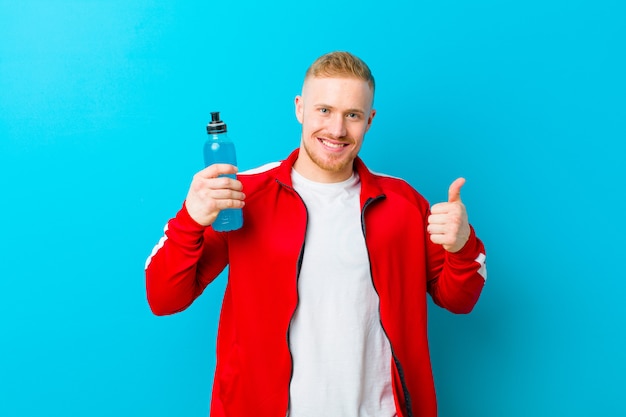 Young blonde man wearing sports clothes