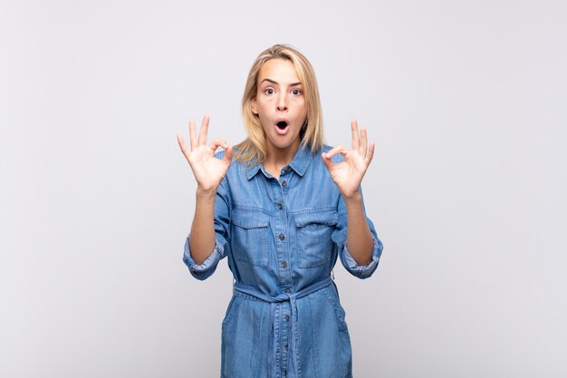 young blonde pretty woman with jean dress