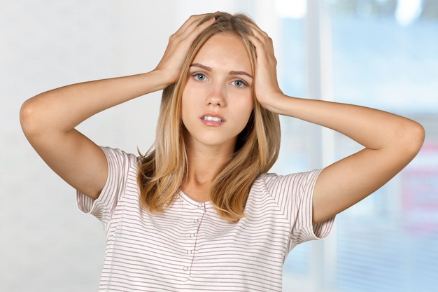 Young blonde tired woman