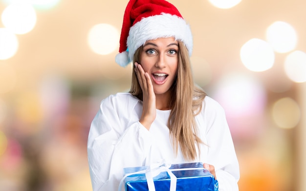 Young blonde woman in christmas holidays