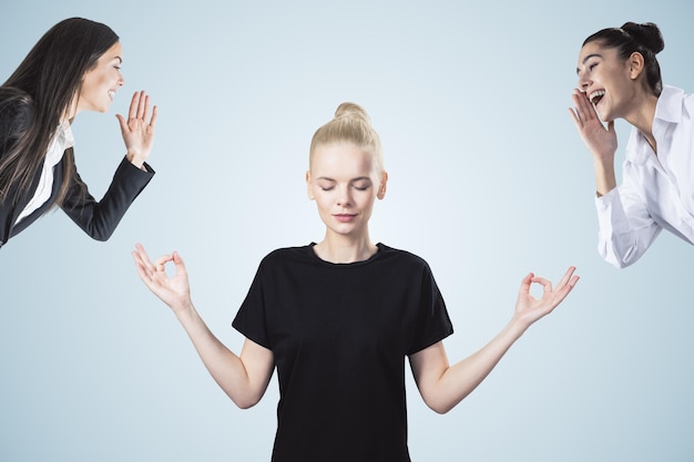 Young blonde woman dealing with bullying at workplace on white background Attractive european businessmen portrait