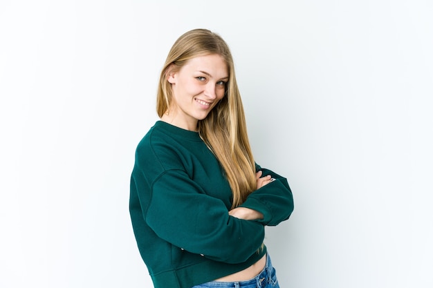 Young blonde woman happy, smiling and cheerful