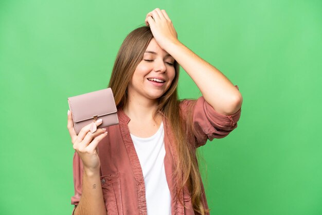 Young blonde woman over isolated background