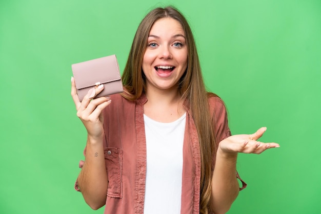 Young blonde woman over isolated background