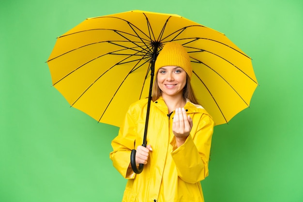 Young blonde woman over isolated background