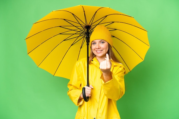 Young blonde woman over isolated background