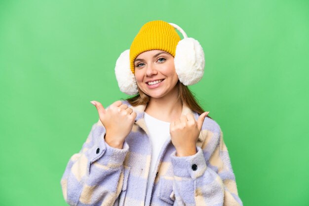 Young blonde woman over isolated background