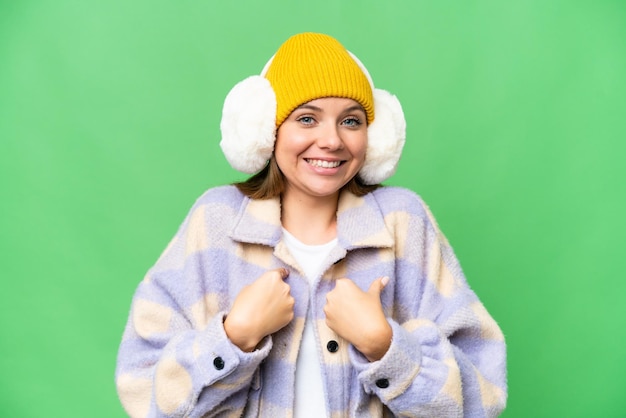 Young blonde woman over isolated background