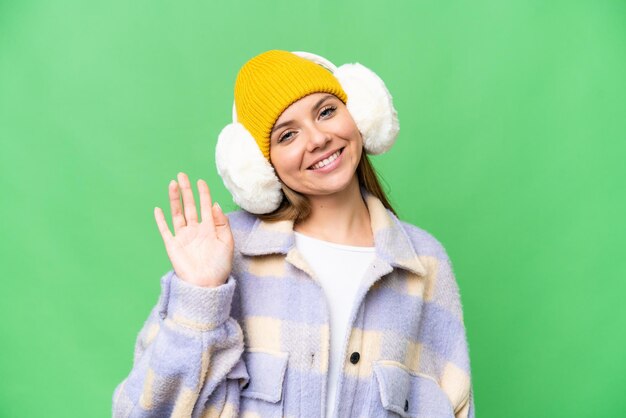 Young blonde woman over isolated background