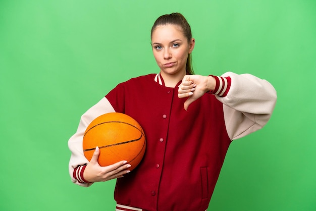 Young blonde woman over isolated background