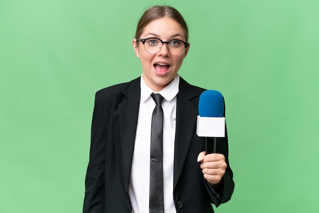 Young blonde woman over isolated background