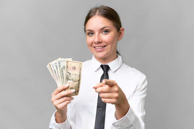 Young blonde woman over isolated background