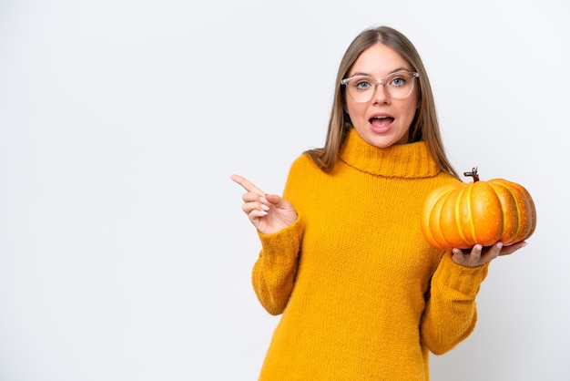 Young blonde woman over isolated background