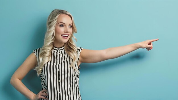 Young blonde woman over isolated wall with hairdresser or barber dress and pointing side