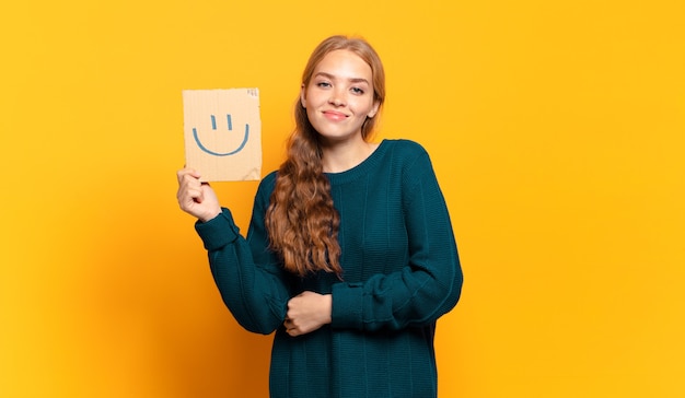 Young blonde woman smile concept