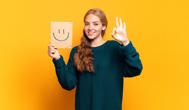 Young blonde woman smile concept