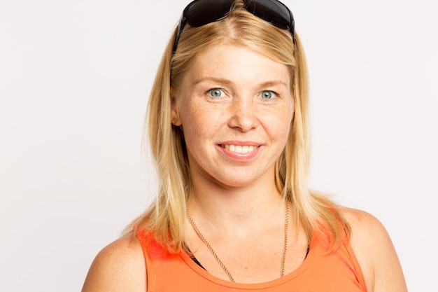 Young blonde woman with freckles