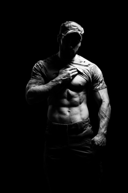 Young Bodybuilder Flexing Muscles  Isolate on Black Blackground  Copy Space