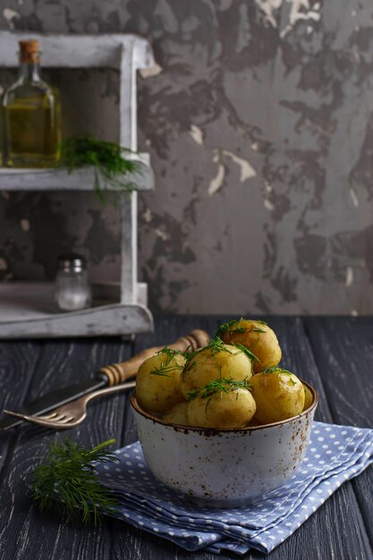 Young boiled potatoes with dill