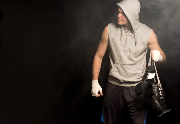 Young boxer arriving for a fight