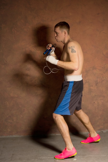 Young boxer training in the ring