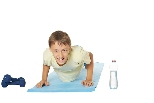 Young boy doing exercises