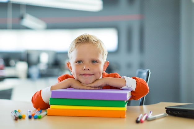 Young boy draw in the office