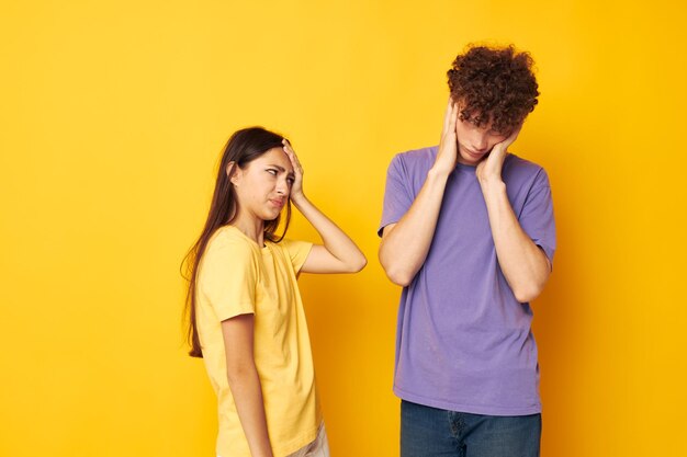 Young boy and girl casual clothes posing emotions antics lifestyle unaltered