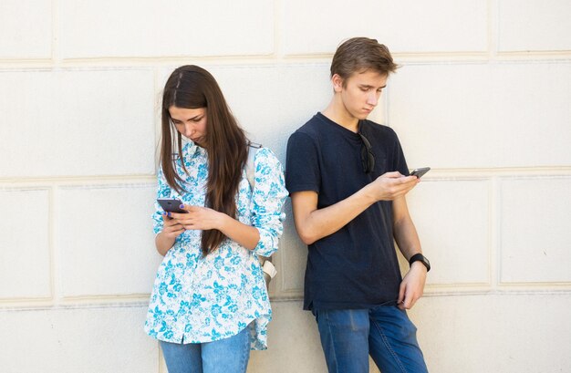 Young boy and girl deep into virtual reality Relationship's problem concept