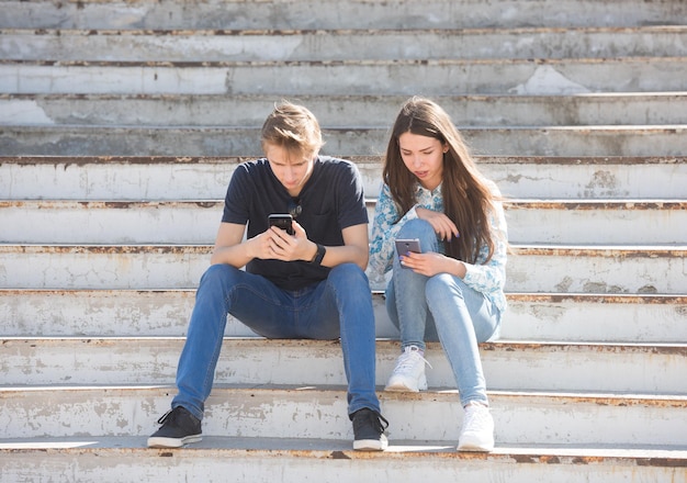 Young boy and girl deep into virtual reality Relationship's problem concept