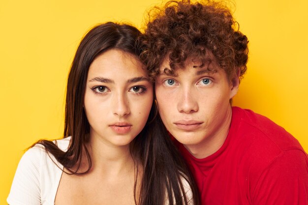 Photo young boy and girl friendship posing hugs together isolated background unaltered