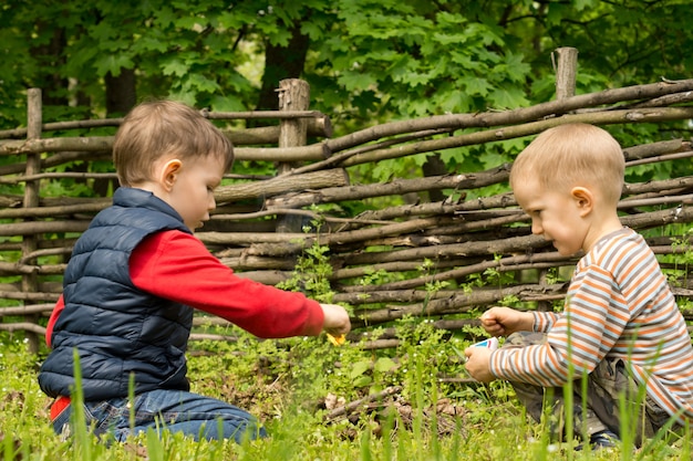 Young boy holding a burning match