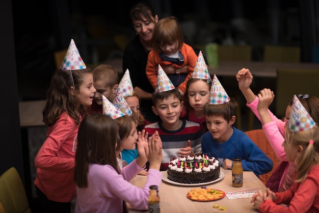 The young boy joyfully celebrating his birthday