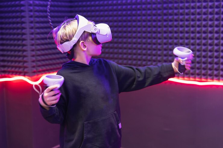 Мальчик в очках виртуальной реальности играет в интерактивную игру Future Technology Concept