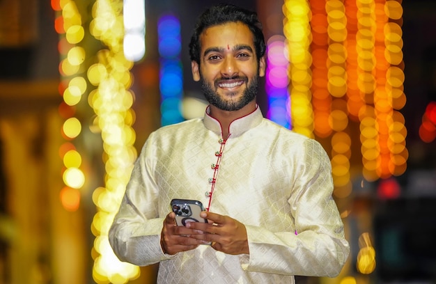 Young Boy in night image wearing traditional dress and beautiful background