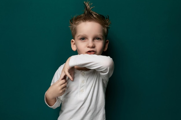 Young boy posing for a picture