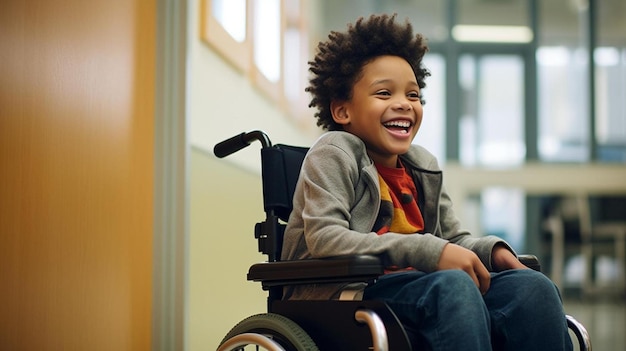 a young boy sitting in a wheel chair laughing