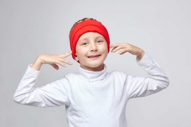 Young boy wearing headband portrait