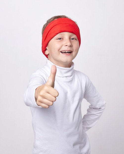 Young boy wearing headband portrait