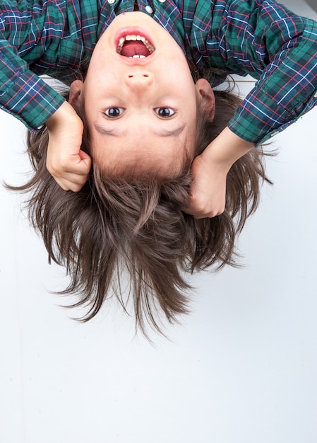 Young boy with his long hair