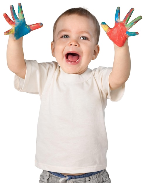 Young boy with paint on his hands