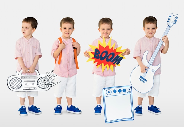 Photo young boy with paper craft art work studio portrait isolated