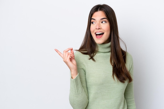 Young Brazilian woman isolated on white background intending to realizes the solution while lifting a finger up