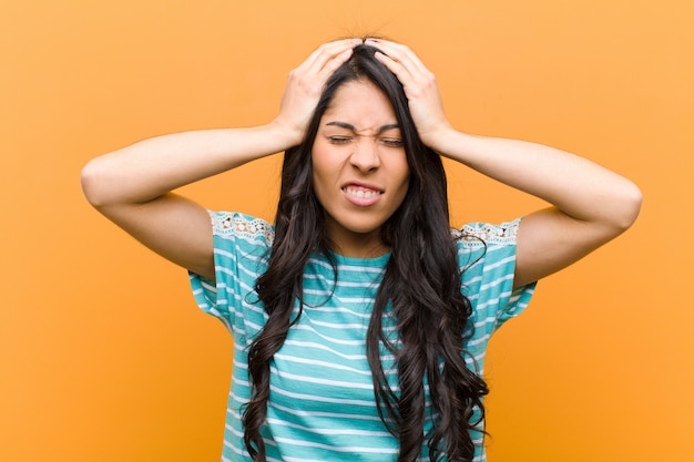 young brunette girl feeling stressed and frustrated