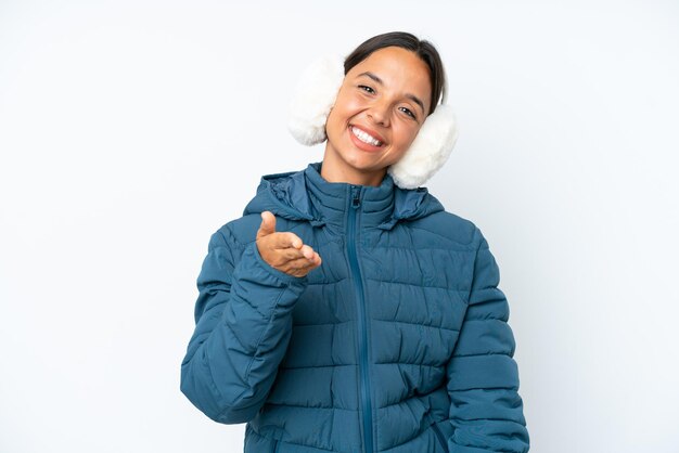 Young brunette hispanic woman on isolated background