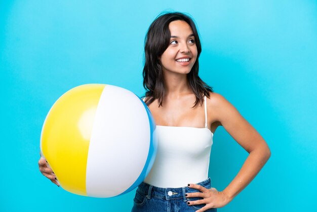 Young brunette hispanic woman on isolated background