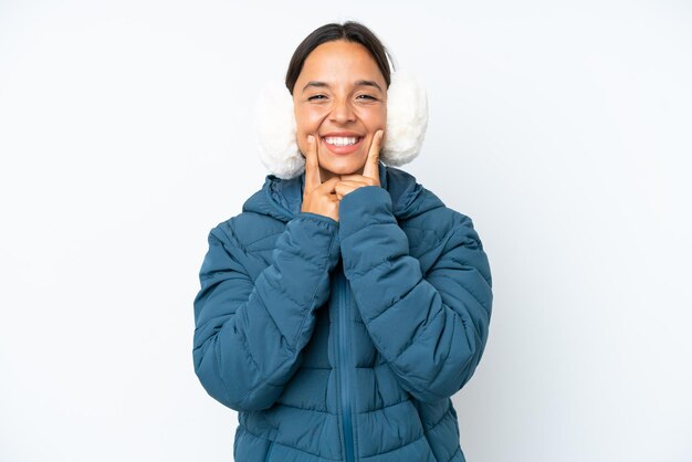 Young brunette hispanic woman on isolated background