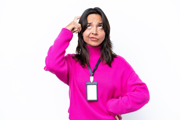 Young brunette hispanic woman on isolated background