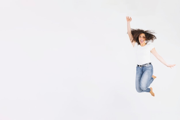 Young brunette jumping