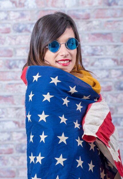 Young brunette with american flag